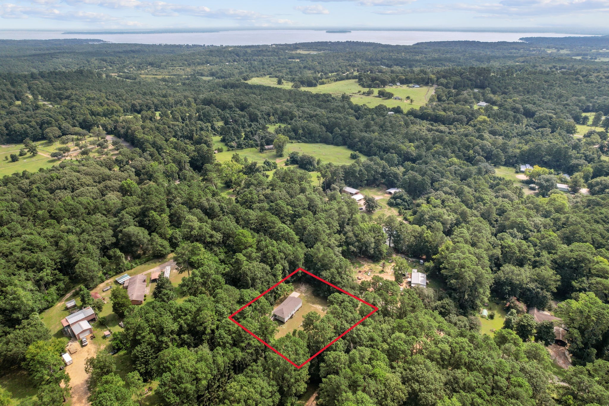 325 Cemetery Road Coldspring, TX 77331 - Photo 27 of 31 a view of a field with an ocean