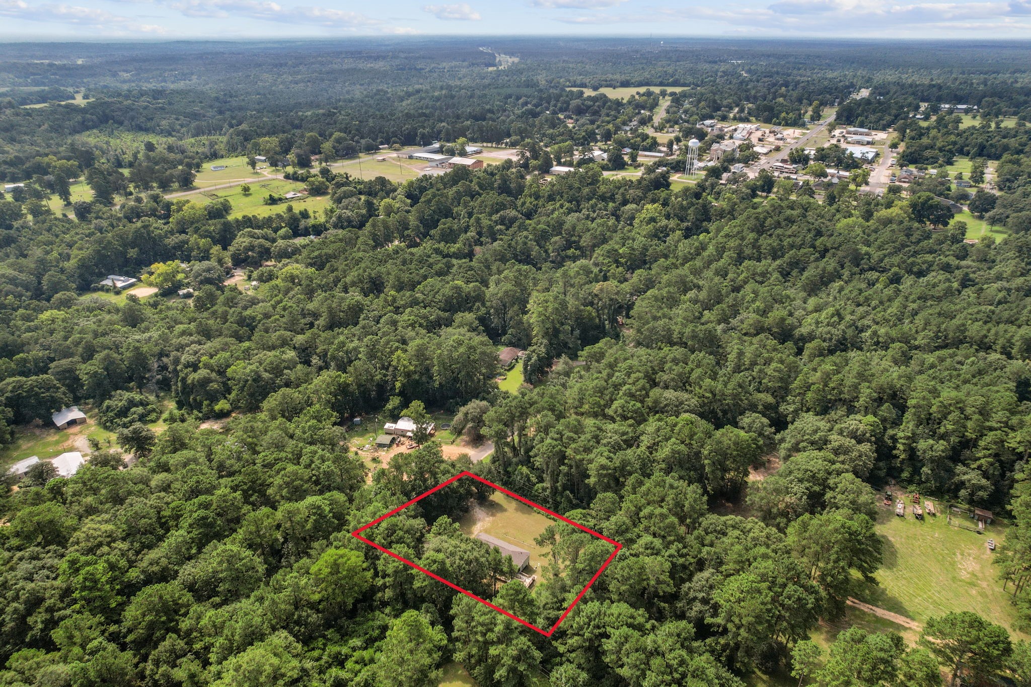 325 Cemetery Road Coldspring, TX 77331 - Photo 28 of 31 an aerial view of multiple house