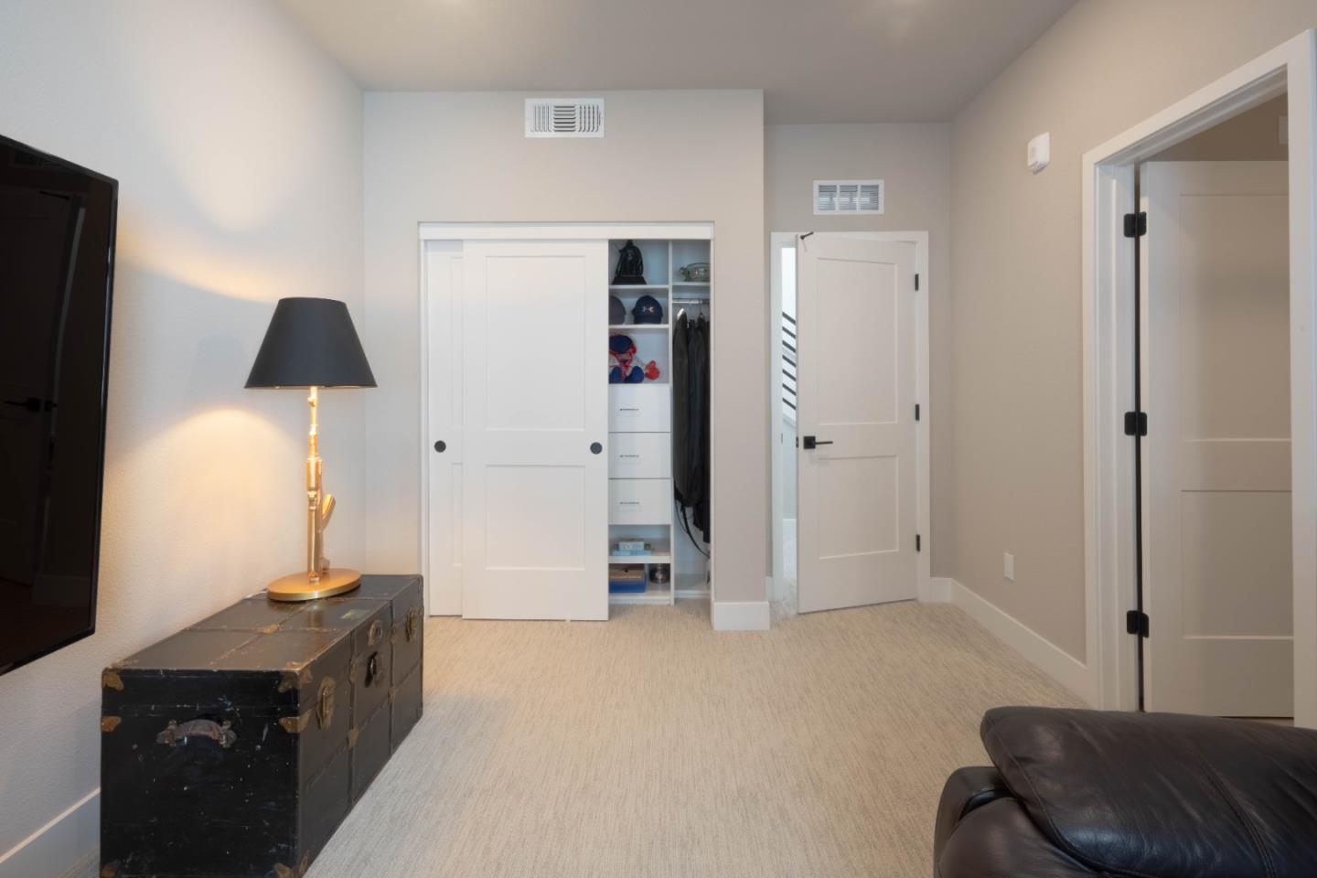 135 8th Street Marina, CA 93933 - Photo 48 of 69 a bedroom with a bed and a dresser