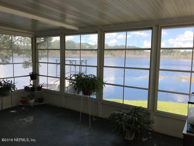 656 Georgetown Denver Road Crescent City, FL 32112 - Photo 5 of 15 Enclosed porch
