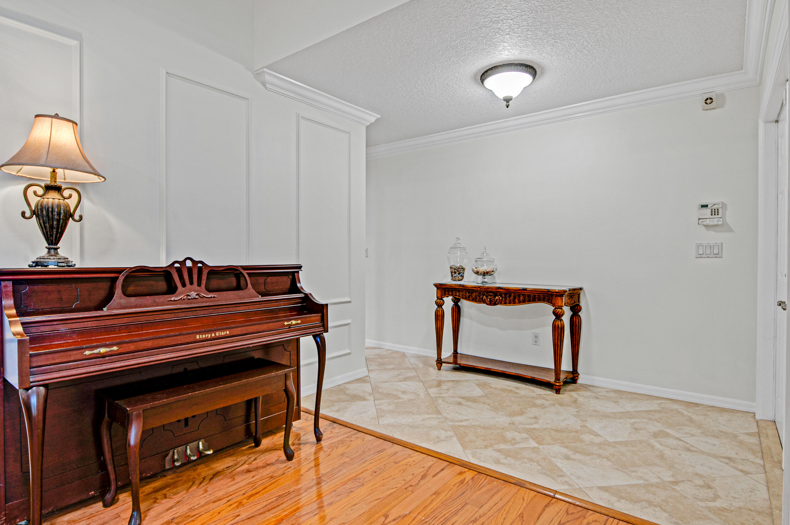 1560 Southwest 16th Street Boca Raton, FL 33486 - Photo 15 of 72 a living room with furniture and a fireplace