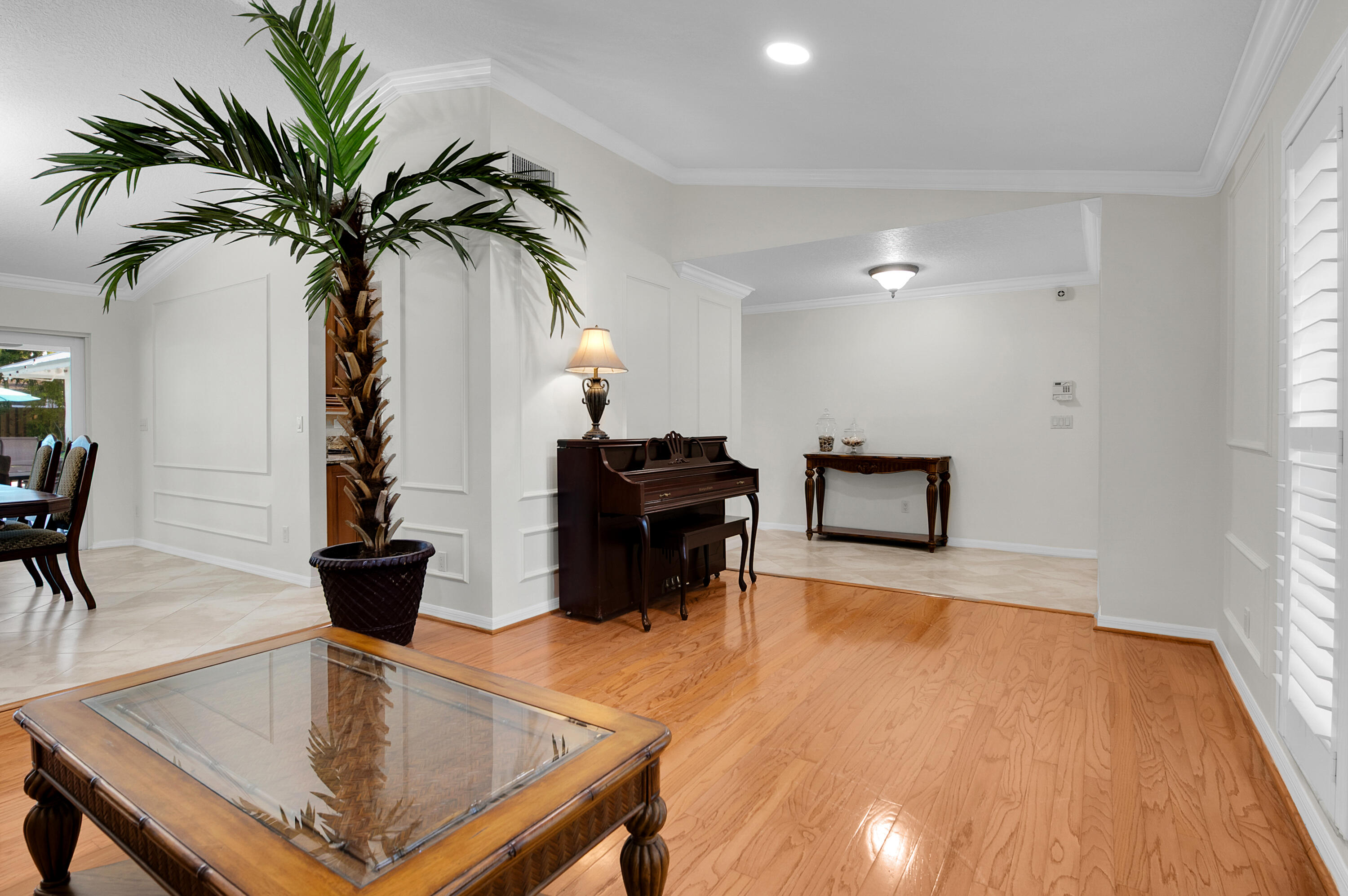 1560 Southwest 16th Street Boca Raton, FL 33486 - Photo 50 of 72 a living room with furniture and a potted plant