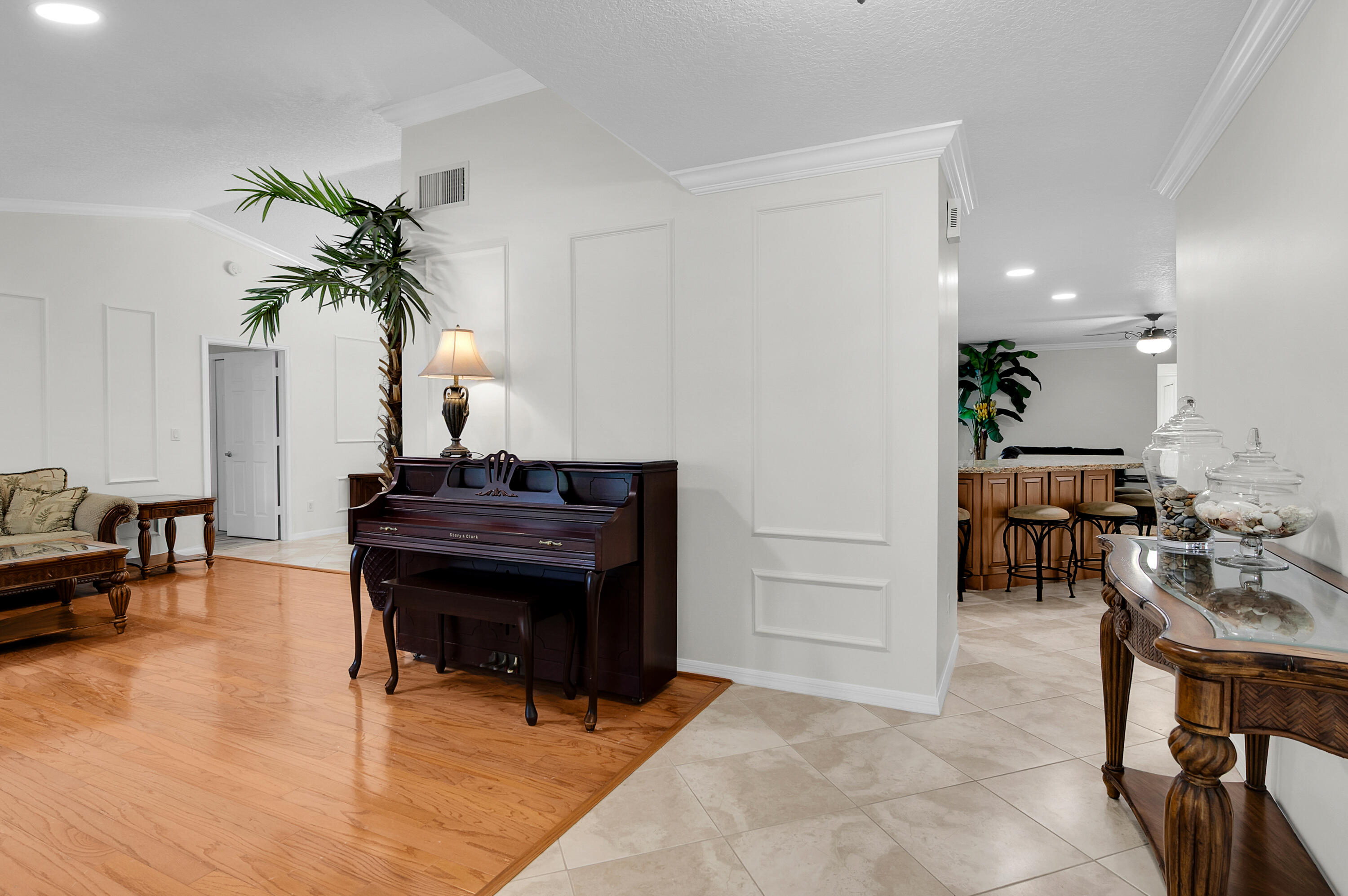 1560 Southwest 16th Street Boca Raton, FL 33486 - Photo 52 of 72 a living room with furniture and a piano