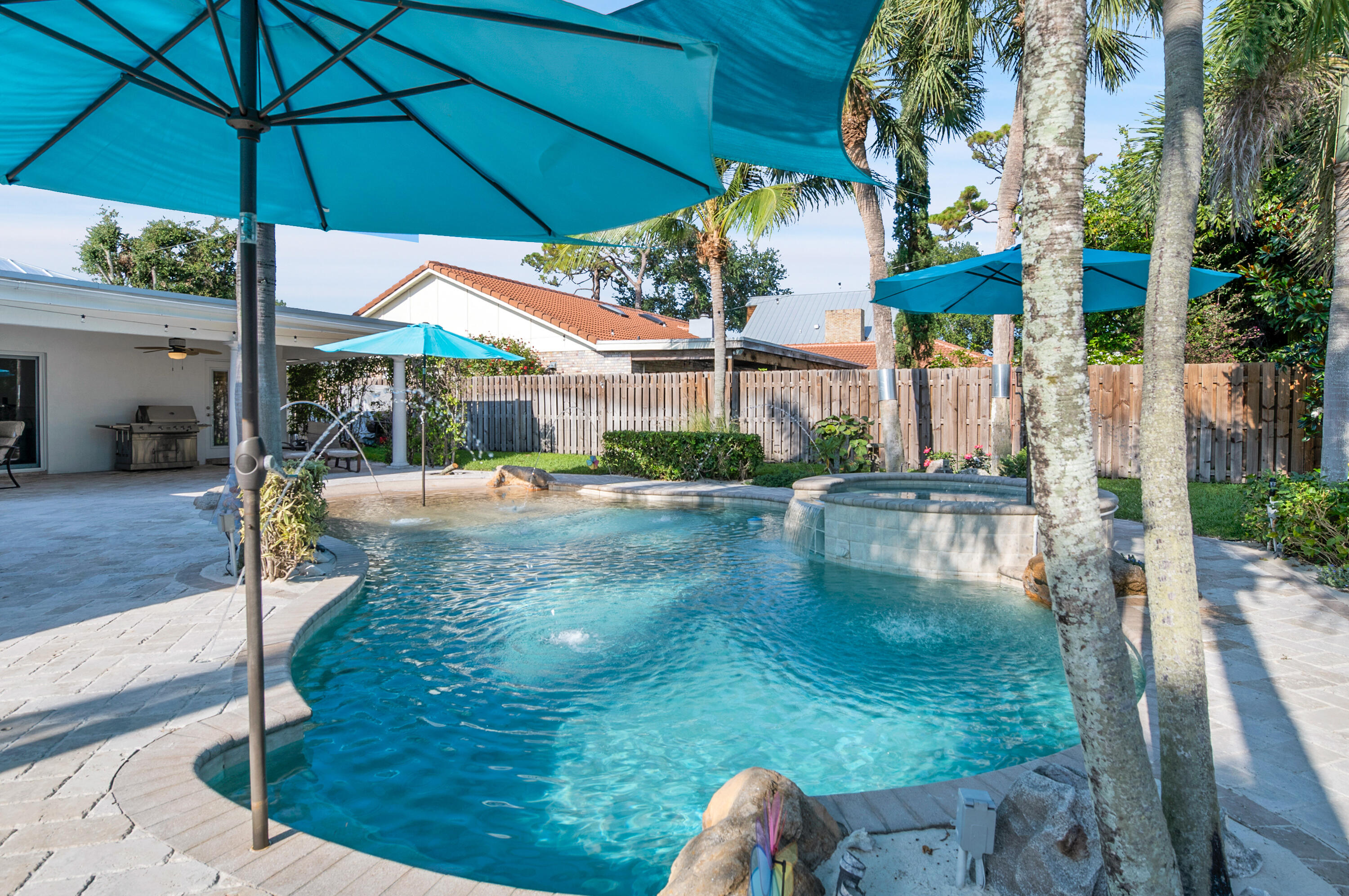 1560 Southwest 16th Street Boca Raton, FL 33486 - Photo 61 of 72 a view of a house with swimming pool