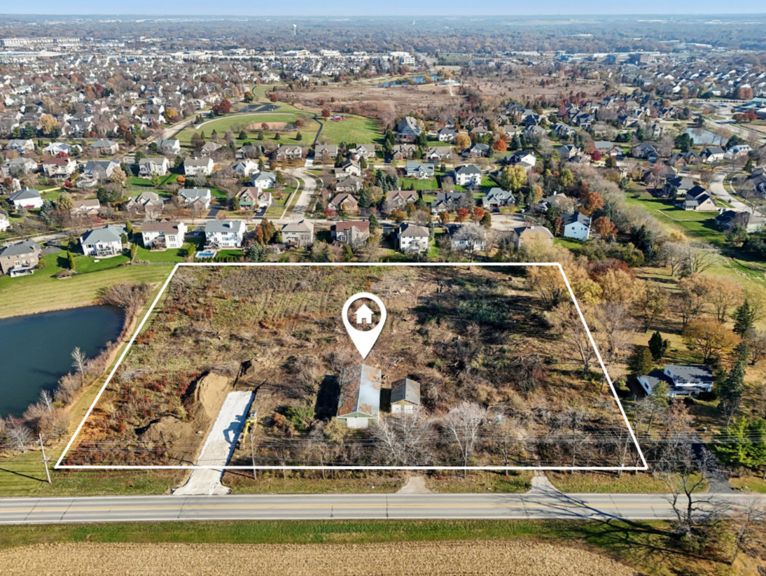 7 A Prairie Grove Drive Geneva, IL 60134 - Photo 2 of 7 an aerial view of a residential houses with outdoor space