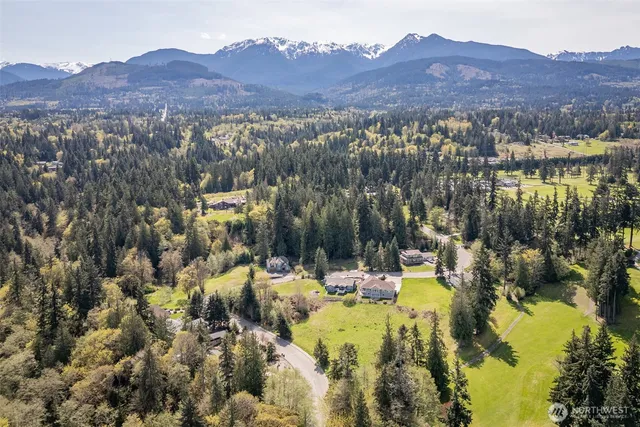 a view of a lake with mountains in the background