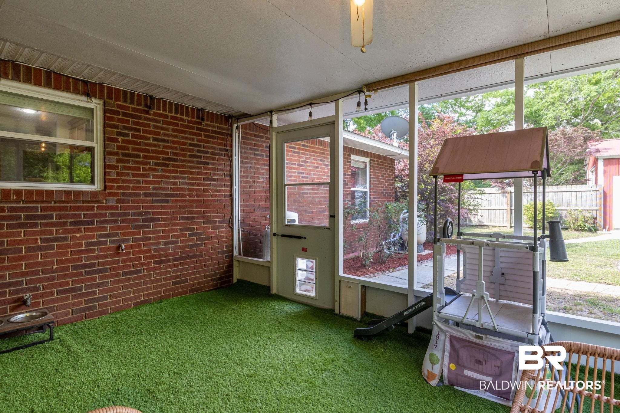 32345 River Lake Road Seminole, AL 36574 - Photo 38 of 56 View of unfurnished sunroom