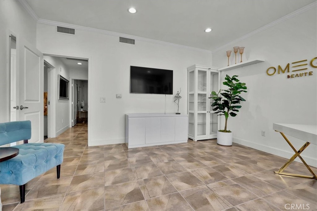 300 East 4th Street, Unit 103 Long Beach, CA 90802 - Photo 35 of 75 a view of livingroom with furniture and a flat screen tv