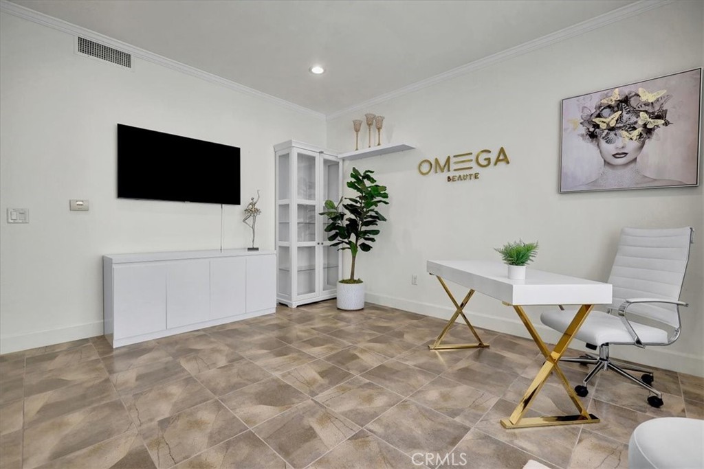 300 East 4th Street, Unit 103 Long Beach, CA 90802 - Photo 36 of 75 a view of a livingroom with furniture and a flat screen tv