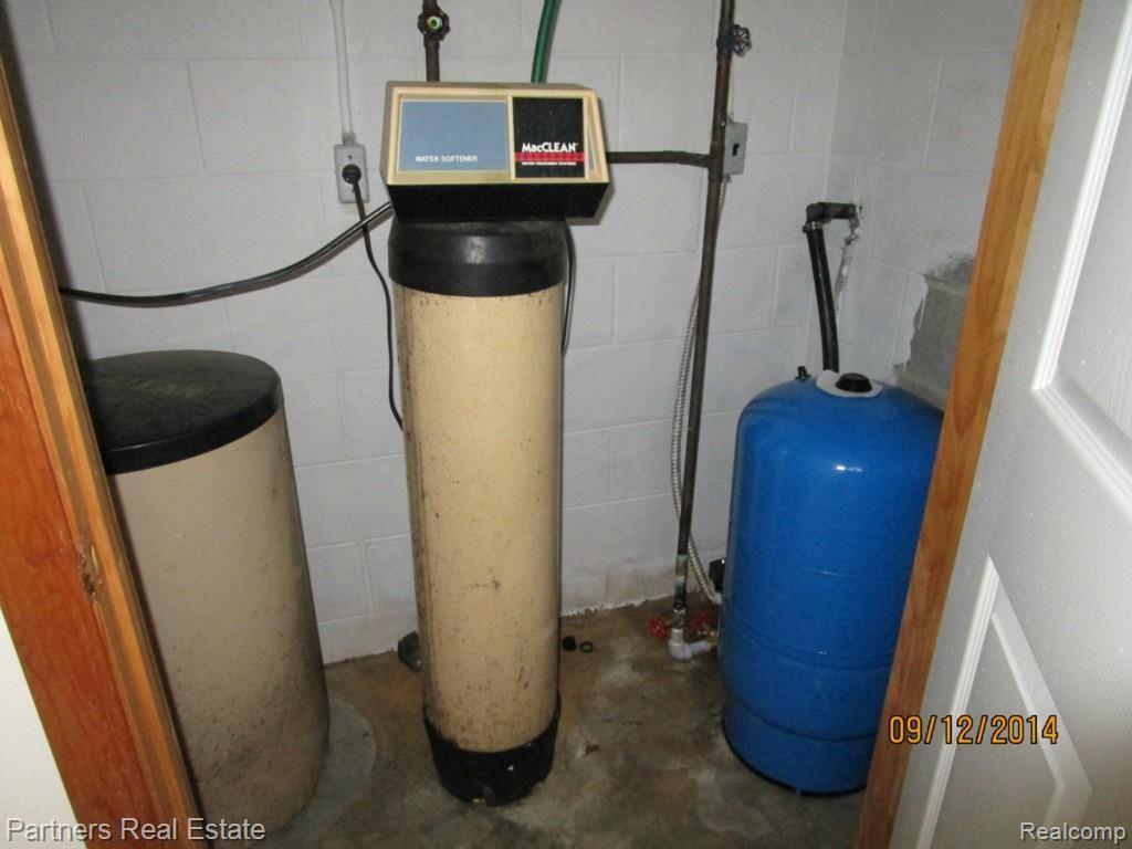 6221 North Nicholson Road Fowlerville, MI 48836 - Photo 20 of 21 Well Tank and Water Softener.jpg
