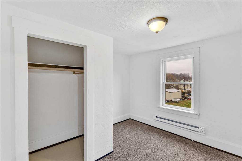 531 5th Avenue Avonmore, PA 15618 - Photo 23 of 25 a view of an empty room with window and wooden floor