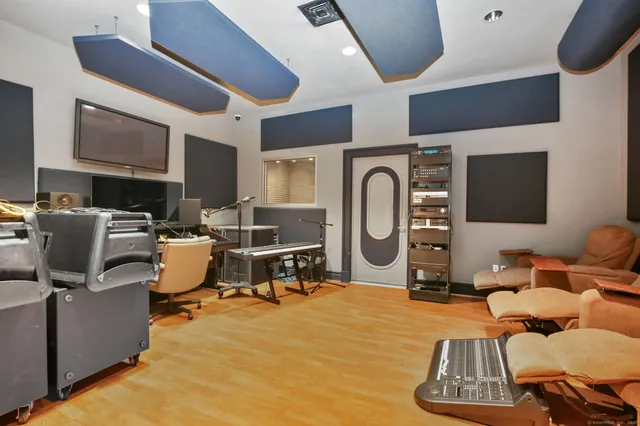 a view of kitchen with stainless steel appliances kitchen island
