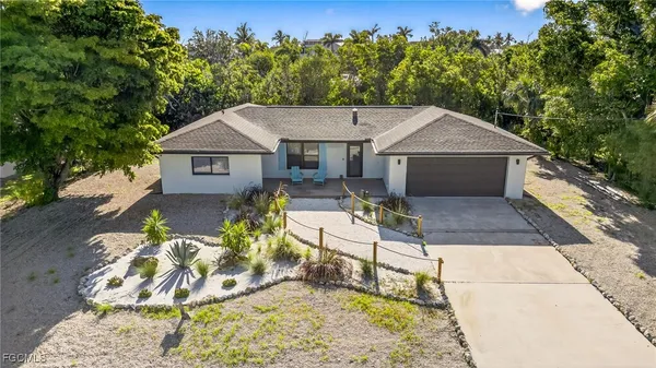 a house view with a garden space