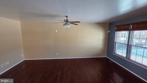 a bedroom with a bed and dresser
