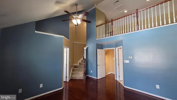 a view of empty room with windows