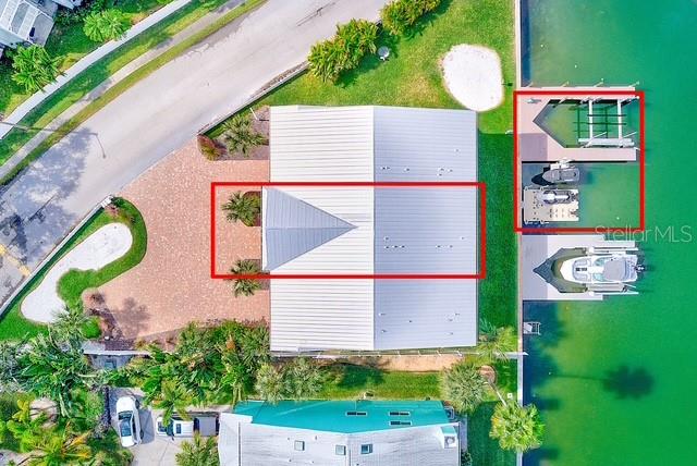 100 Windrush Boulevard, Unit 2 Indian Rocks Beach, FL 33785 - Photo 7 of 73 a bird view of a house with a backyard