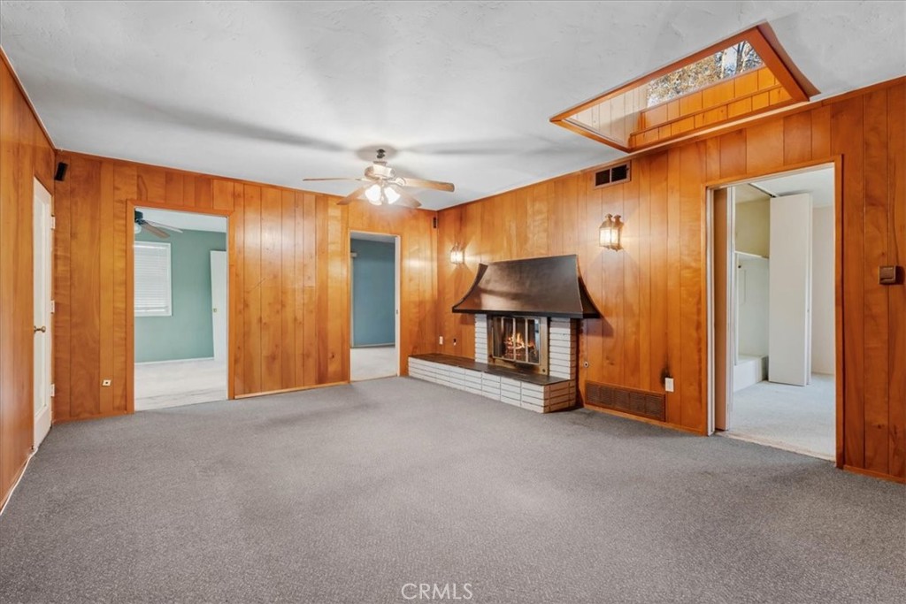 2807 Wyoming Way Riverside, CA 92506 - Photo 16 of 40 a view of empty room with wooden floor and windows