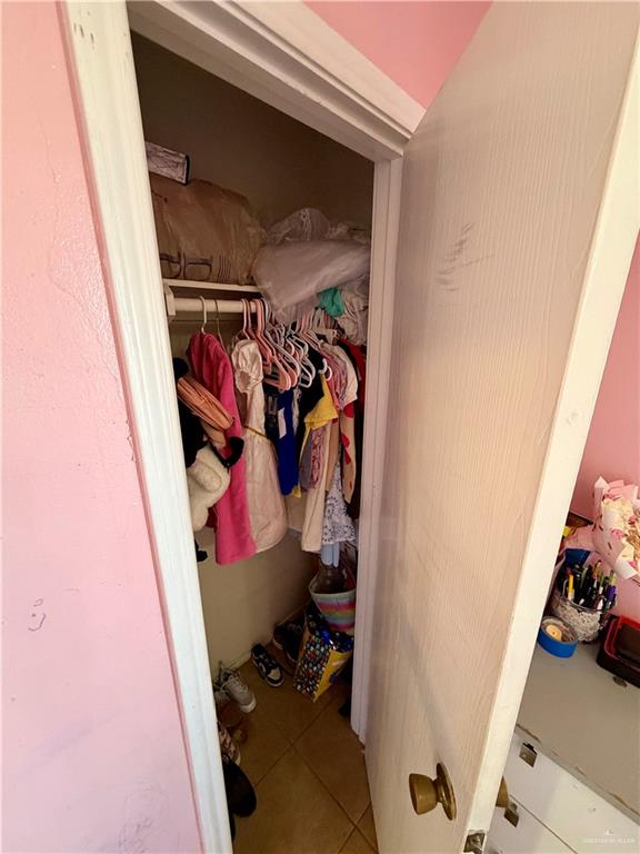 434 Serg Loop Alamo, TX 78516 - Photo 11 of 17 a view of walk in closet with clothes and shoes