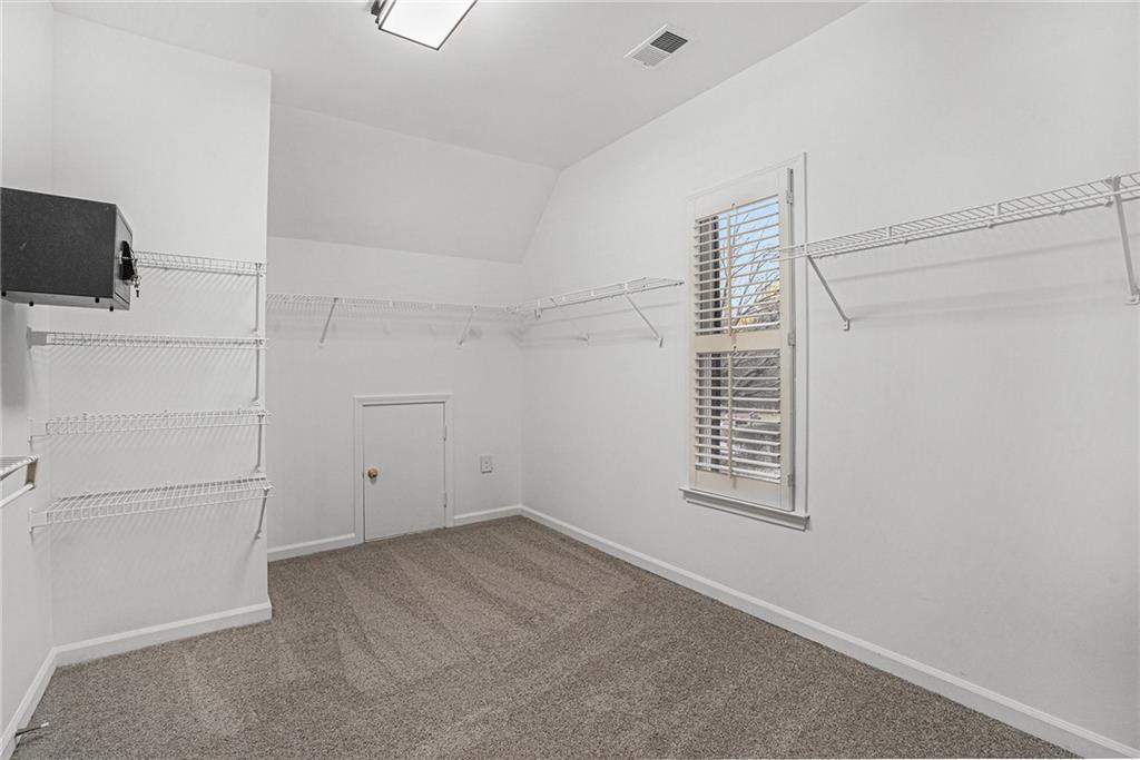 523 Sycamore Point Woodstock, GA 30189 - Photo 18 of 34 an empty room with windows