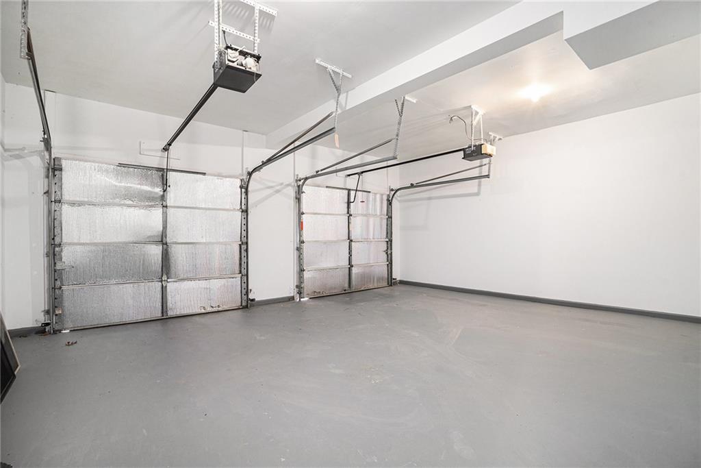 523 Sycamore Point Woodstock, GA 30189 - Photo 29 of 34 a view of a garage