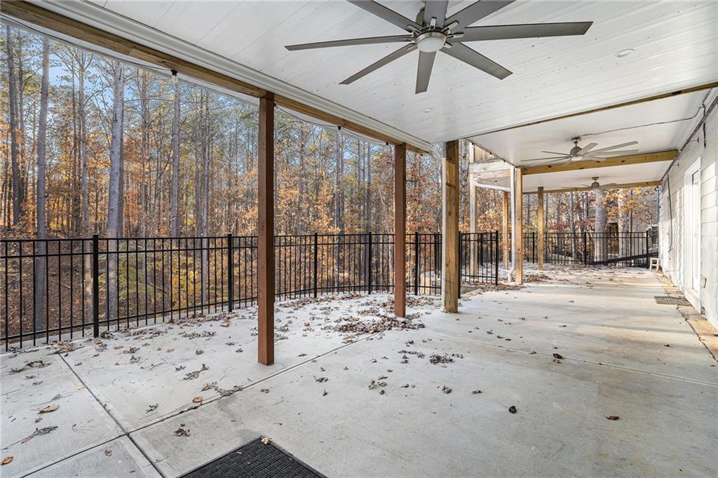 523 Sycamore Point Woodstock, GA 30189 - Photo 30 of 34 a view of a porch with a backyard