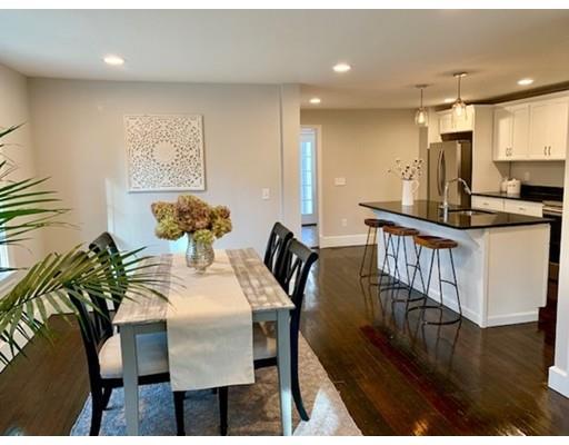 177 S Road Holden, MA 01520 - Photo 6 of 22 a view of a dining room with furniture and wooden floor
