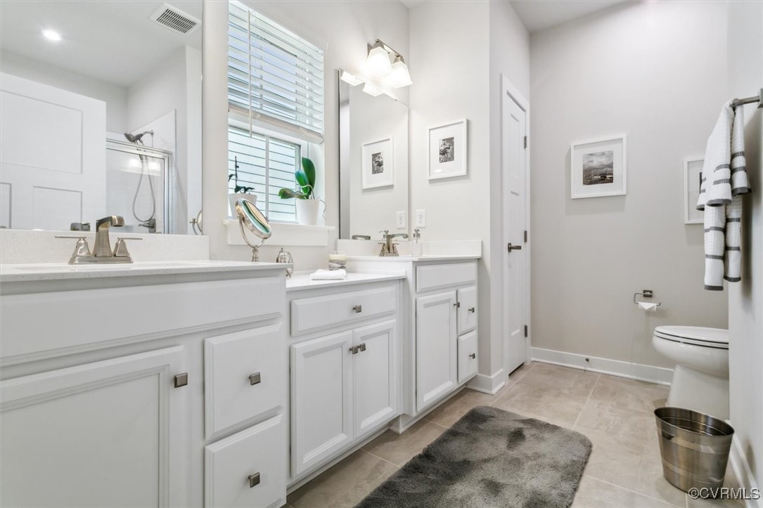 115 Apprentice Landing Williamsburg, VA 23185 - Photo 37 of 49 a spacious bathroom with a double vanity sink mirror and toilet
