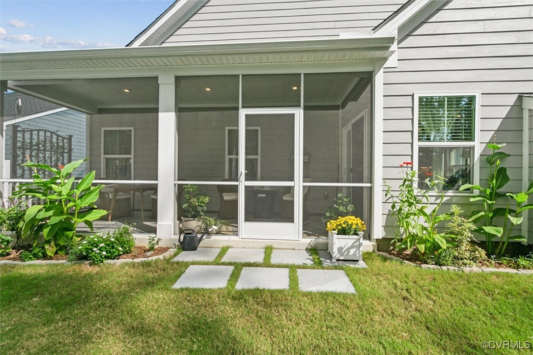 115 Apprentice Landing Williamsburg, VA 23185 - Photo 4 of 49 a house view with a garden space