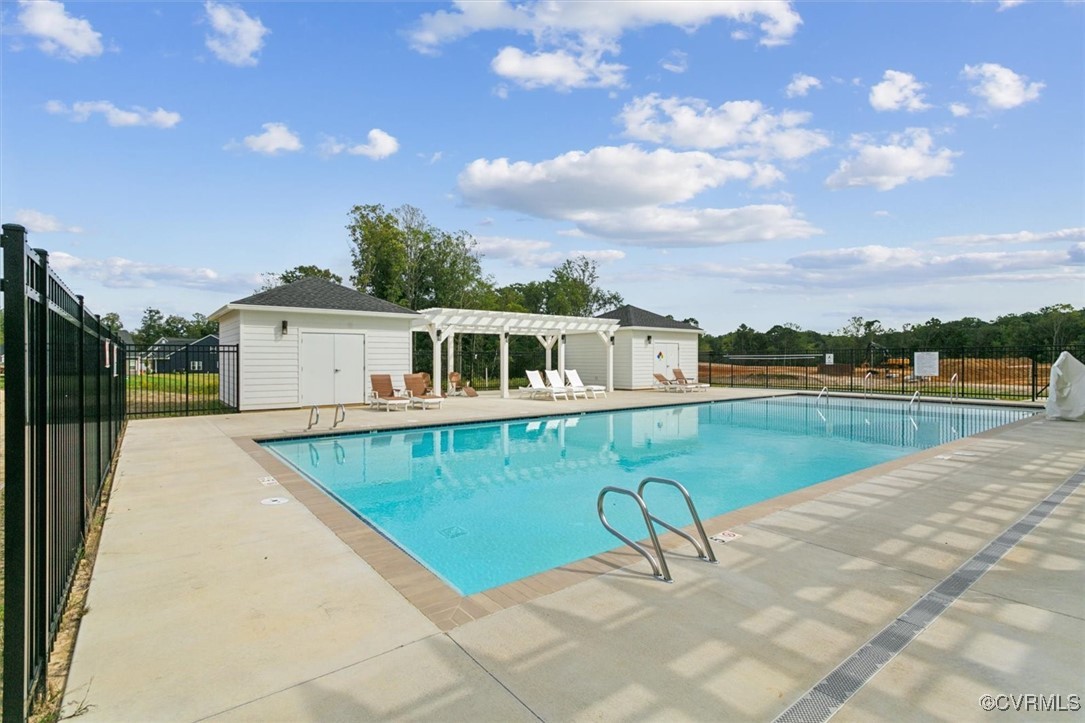 115 Apprentice Landing Williamsburg, VA 23185 - Photo 47 of 49 a view of a house with a swimming pool and sitting area