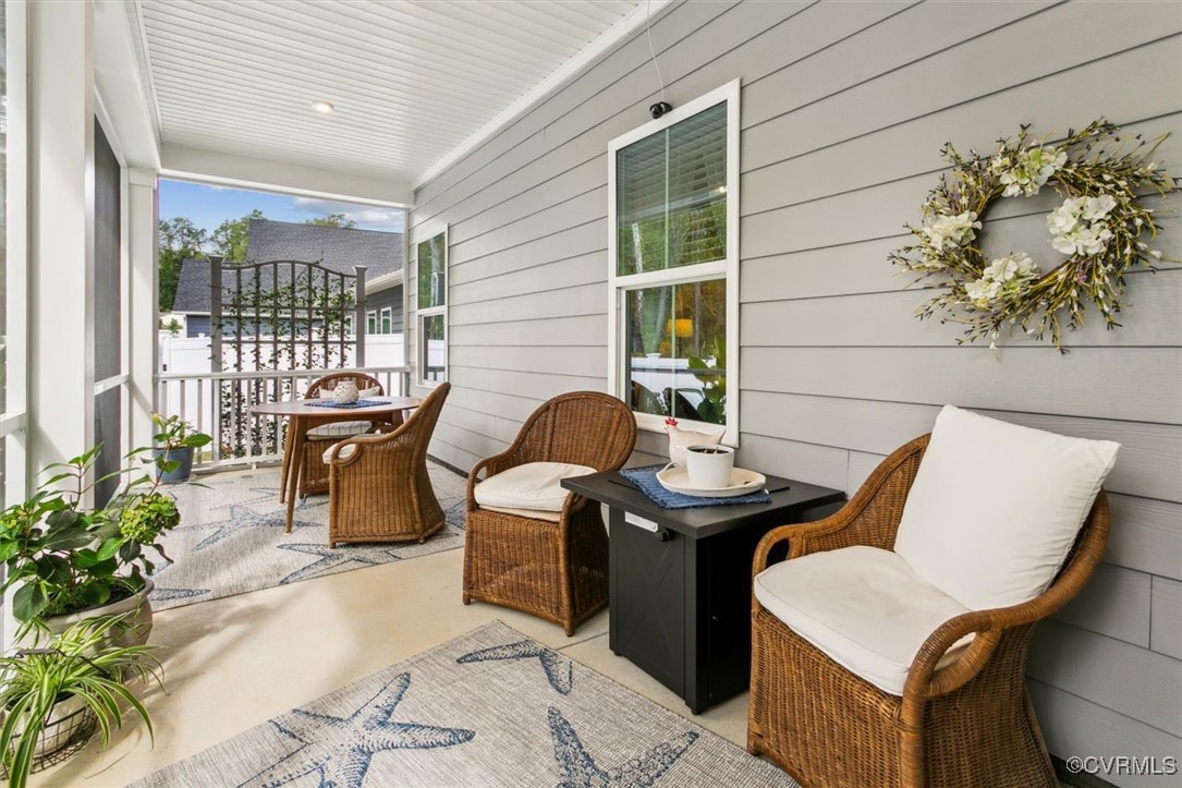 115 Apprentice Landing Williamsburg, VA 23185 - Photo 5 of 49 a view of a patio with table and chairs and potted plants