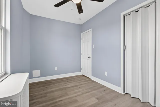 a view of an empty room and window