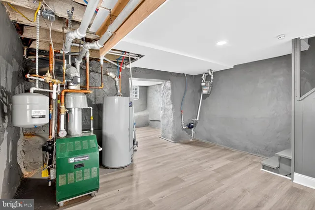 a bathroom with a sink and shower