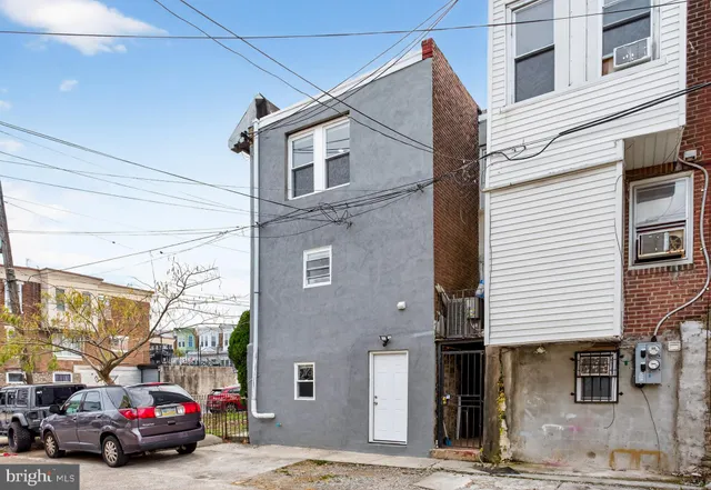 a view of a car park in front of a building