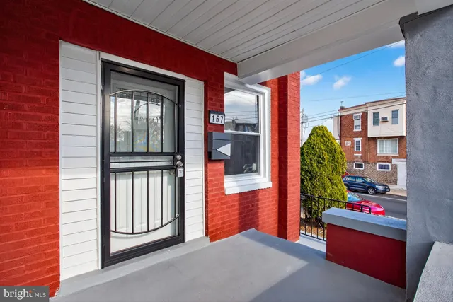 a living room filled with furniture and a table