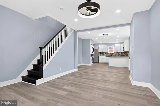 a view of kitchen and kitchen with a window