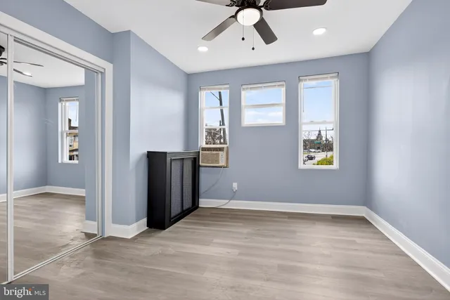wooden floor and windows in an empty room