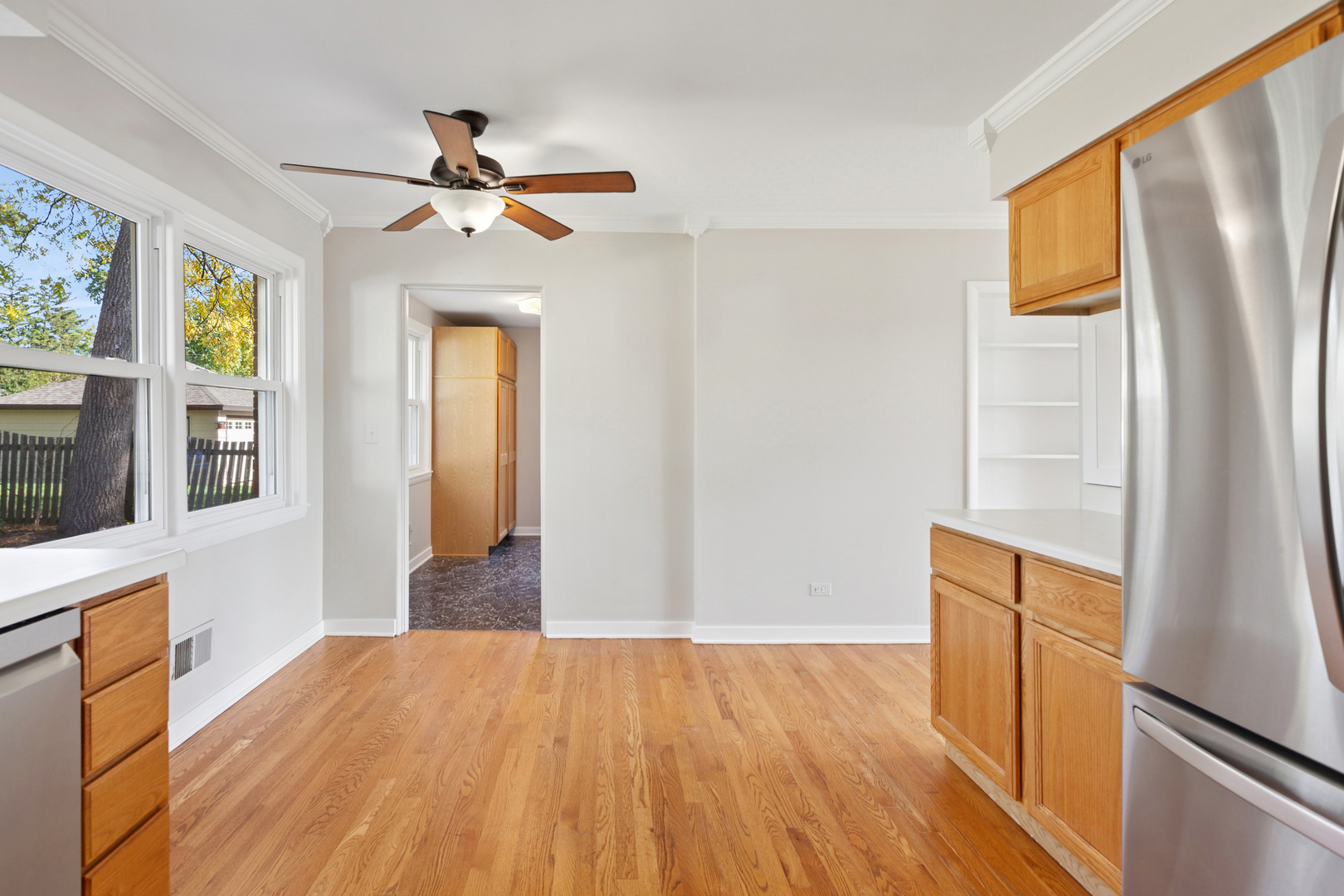 270 Hawthorne Boulevard Glen Ellyn, IL 60137 - Photo 11 of 34 a view of empty room with wooden floor and fan