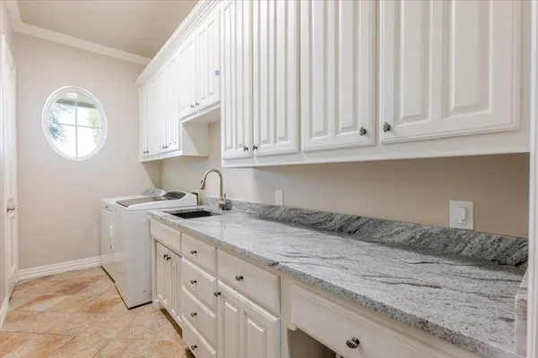 a bathroom with a sink a toilet and vanity
