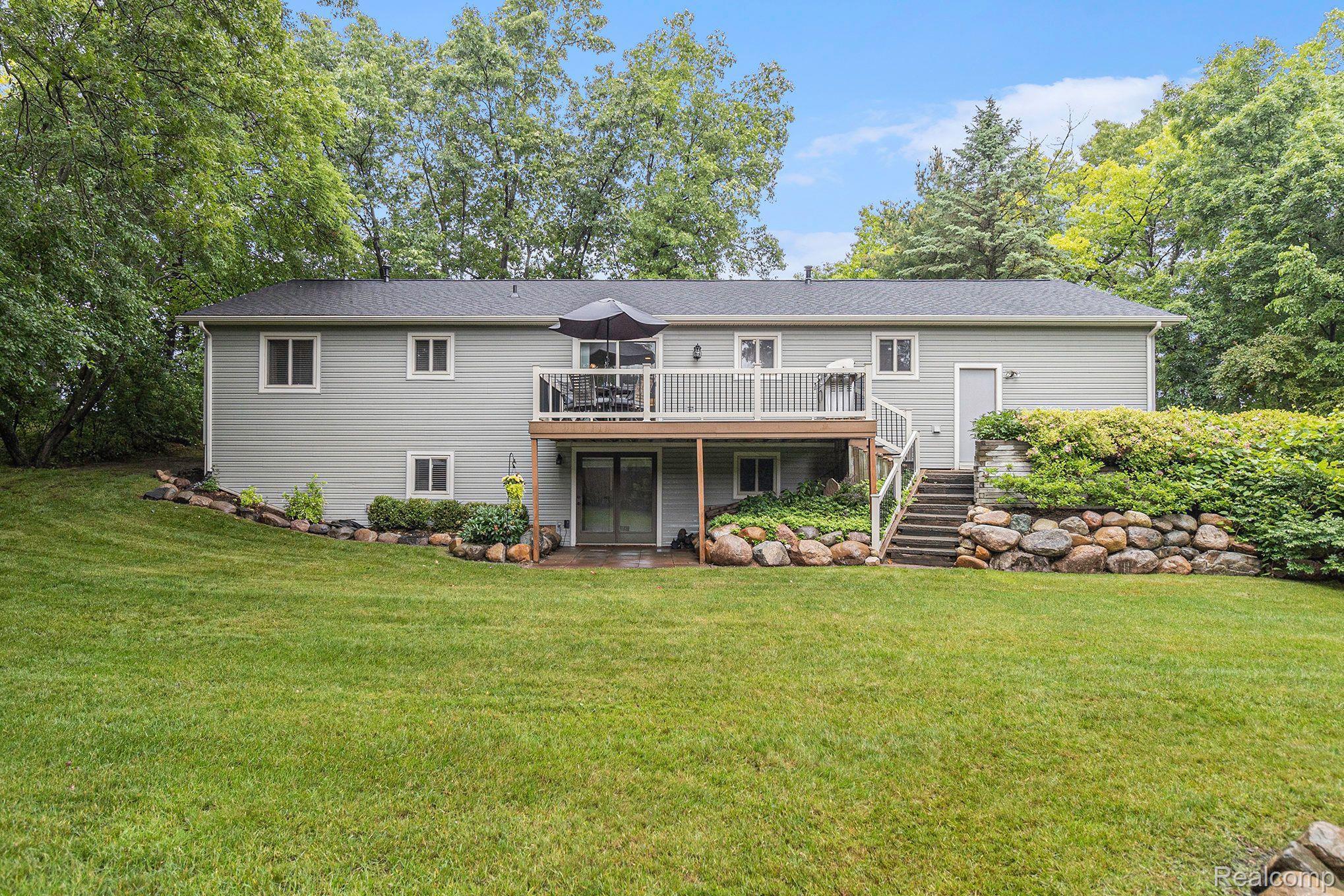 1746 Ridge Road White Lake, MI 48383 - Photo 35 of 39 Spacious Backyard is