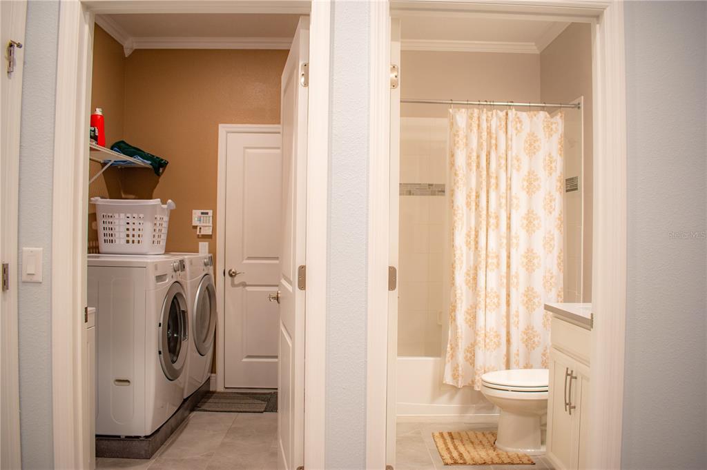 17993 Gourd Neck Loop Winter Garden, FL 34787 - Photo 22 of 29 a bathroom with a toilet and a shower