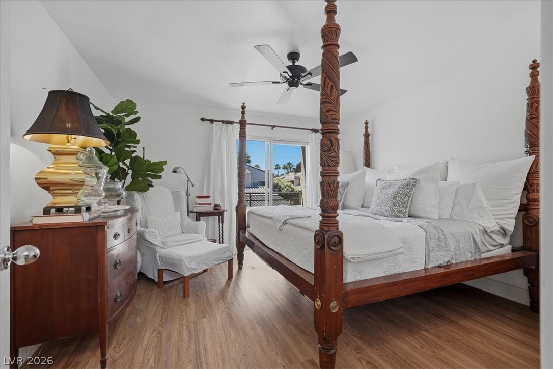 6250 West Flamingo Road, Unit 93 Las Vegas, NV 89103 - Photo 23 of 38 This spacious bedroom features ample natural light and direct access to an outdoor area.