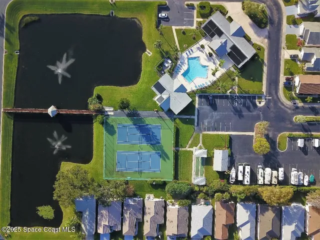 an aerial view of houses and yard