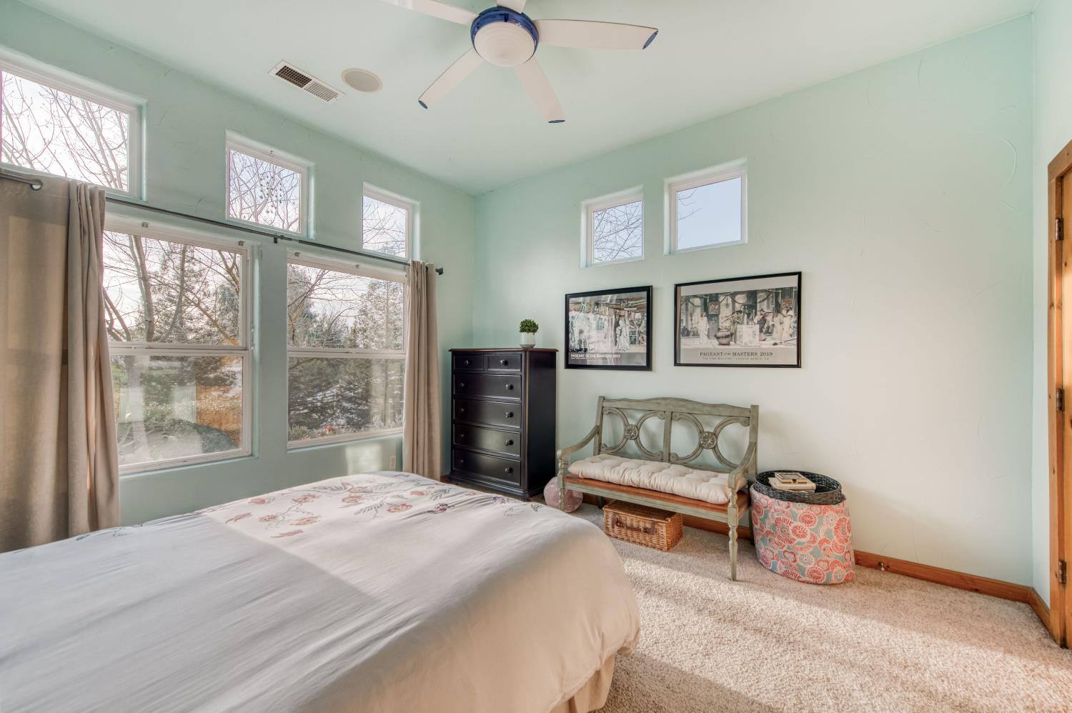 17433 El Dorado Madera, CA 93636 - Photo 17 of 49 a bedroom with a large bed and a couch