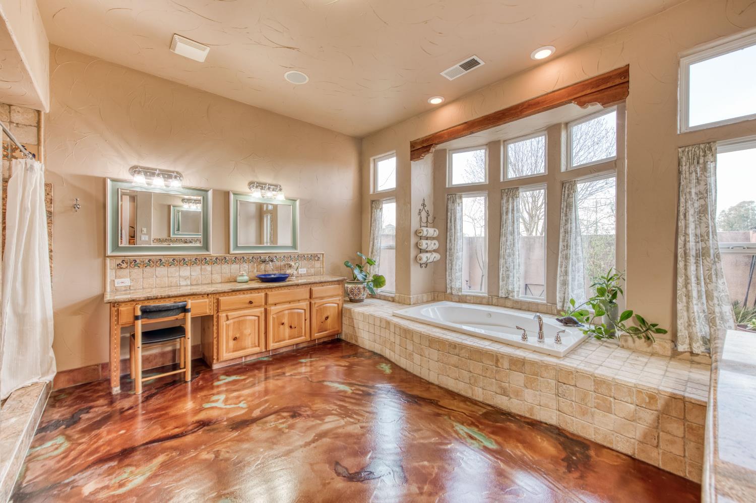 17433 El Dorado Madera, CA 93636 - Photo 22 of 49 a large bathroom with a large tub and sink