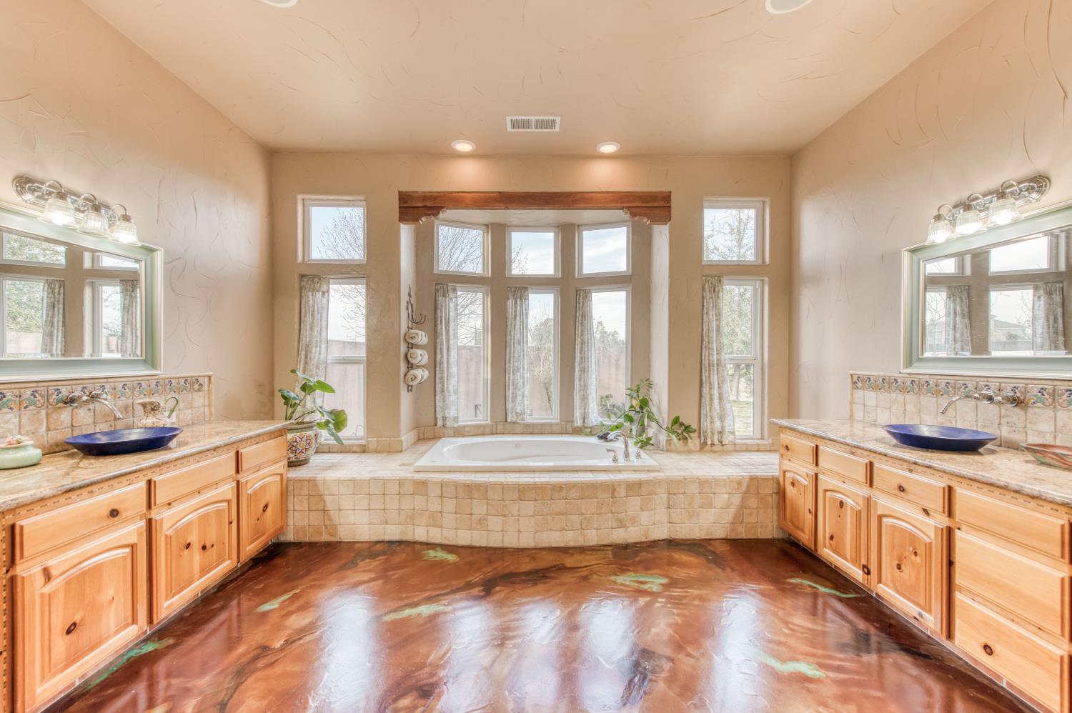 17433 El Dorado Madera, CA 93636 - Photo 23 of 49 a spacious bathroom with a large tub and sink