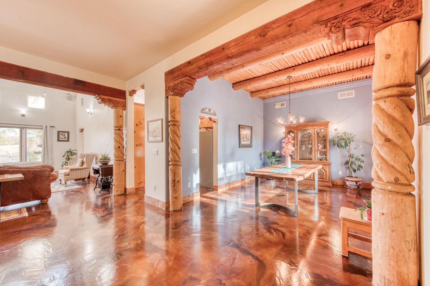 17433 El Dorado Madera, CA 93636 - Photo 3 of 49 a dining hall with couches a dining table and chairs with outer view