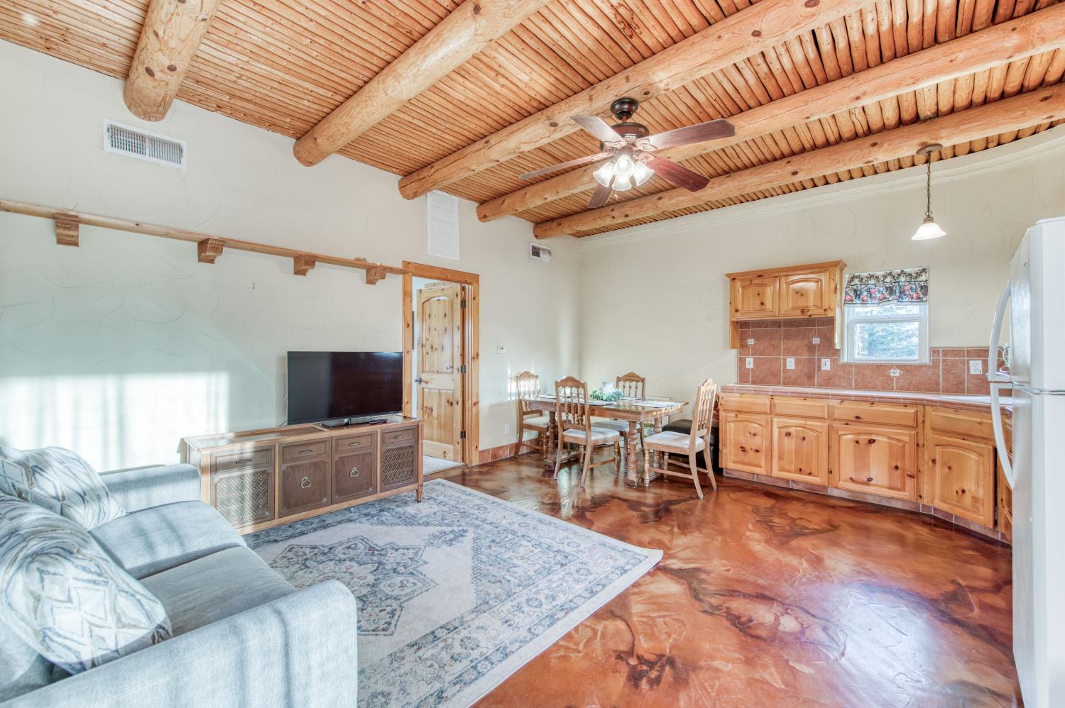 17433 El Dorado Madera, CA 93636 - Photo 40 of 49 a living room with furniture and a flat screen tv