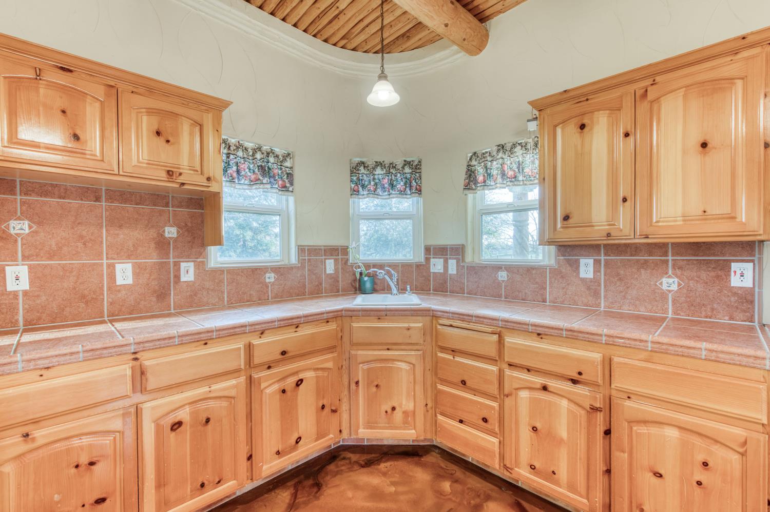 17433 El Dorado Madera, CA 93636 - Photo 43 of 49 a large kitchen with white cabinets