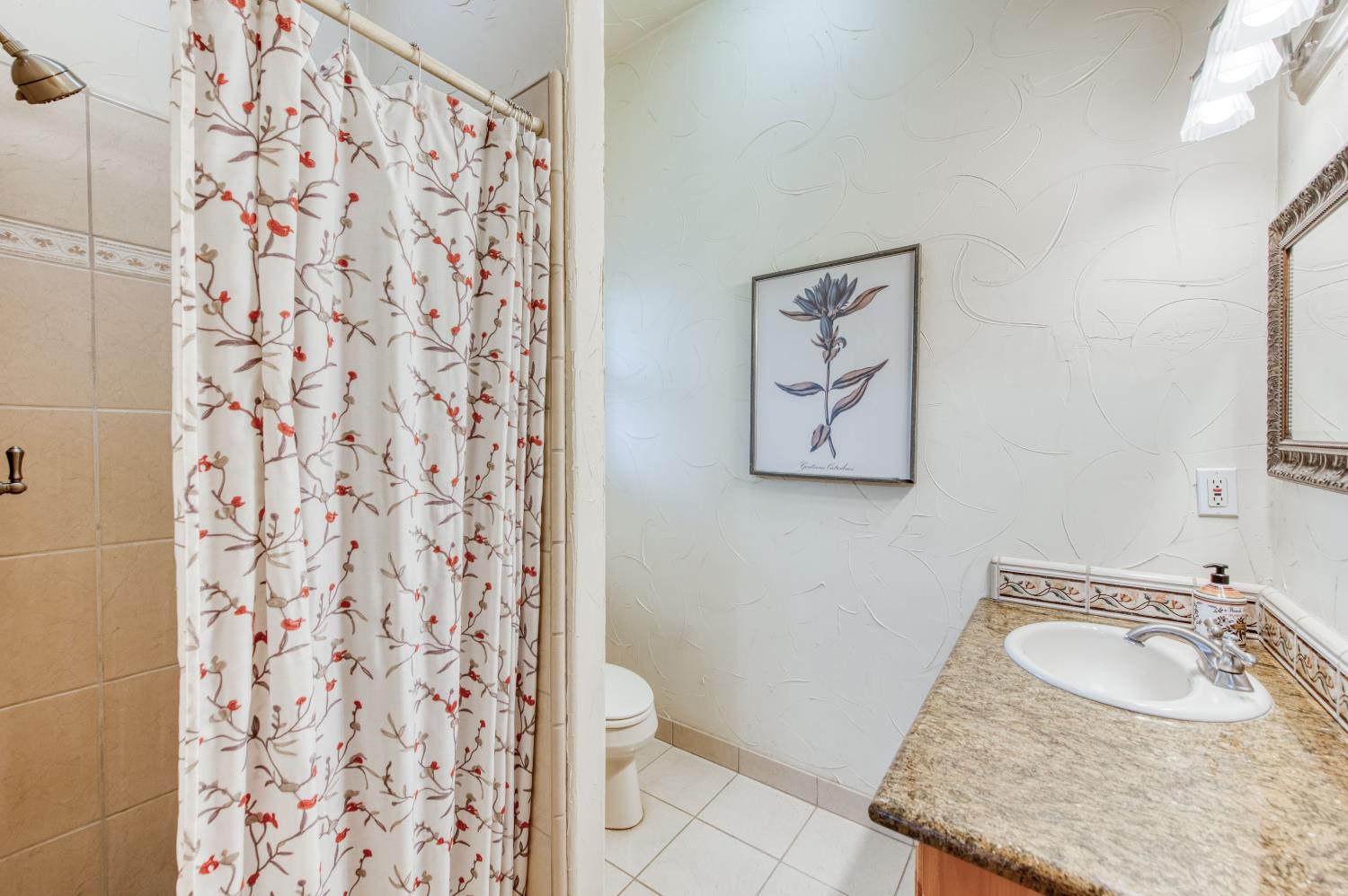 17433 El Dorado Madera, CA 93636 - Photo 47 of 49 a bathroom with a sink toilet and shower