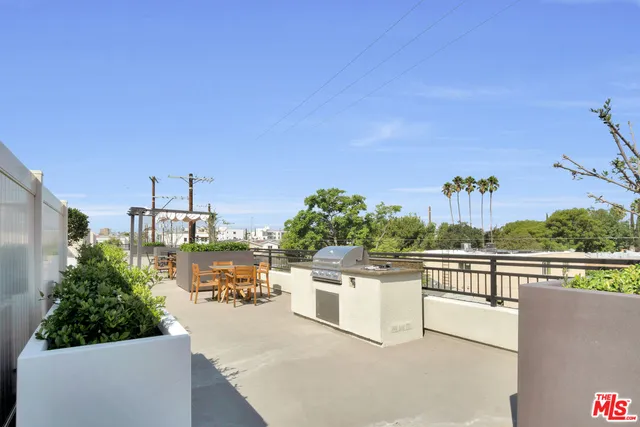 a view of a terrace with chairs